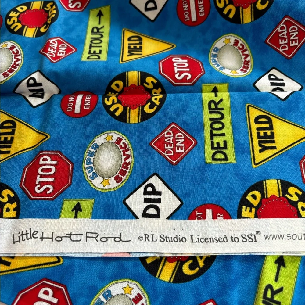 SSI Little Hot Rod Blue Traffic Sign Patterned Fabric - 1 Yard Cut. Cotton
